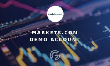 Beginner trader exploring CMC Markets demo account interface on laptop